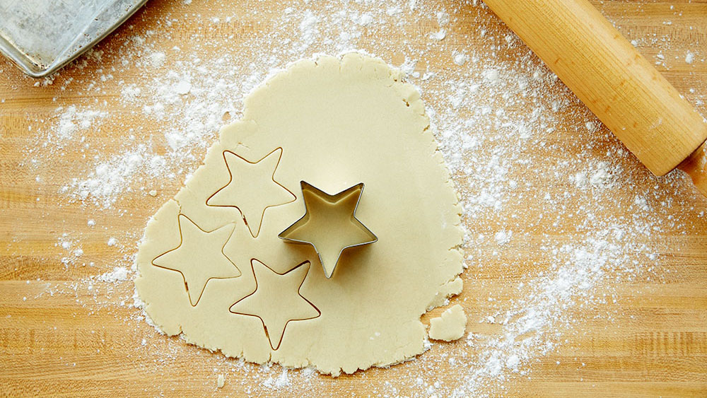 Cookie dough cut into star shapes